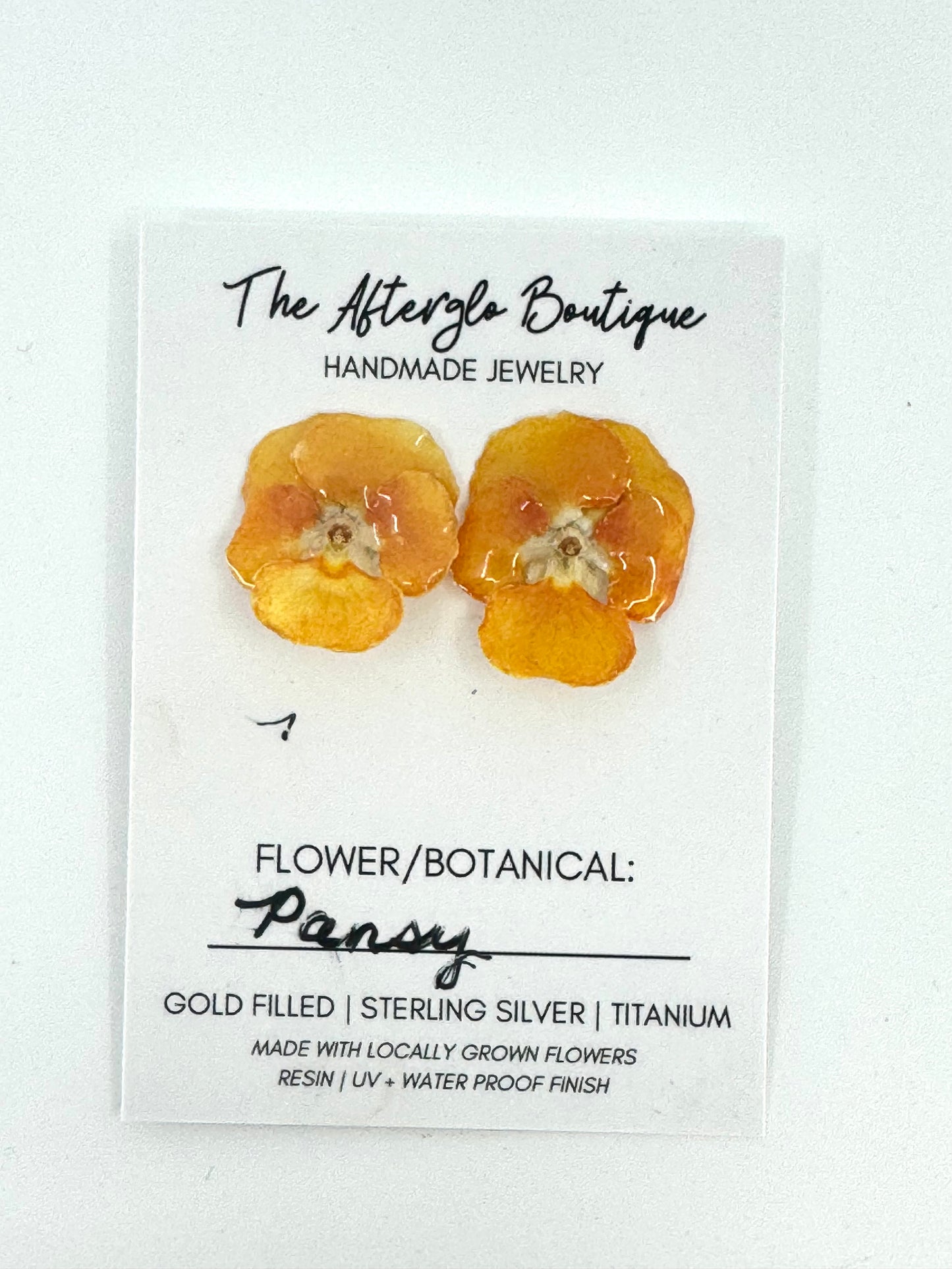 GENUINE ORANGE PANSY STUDS